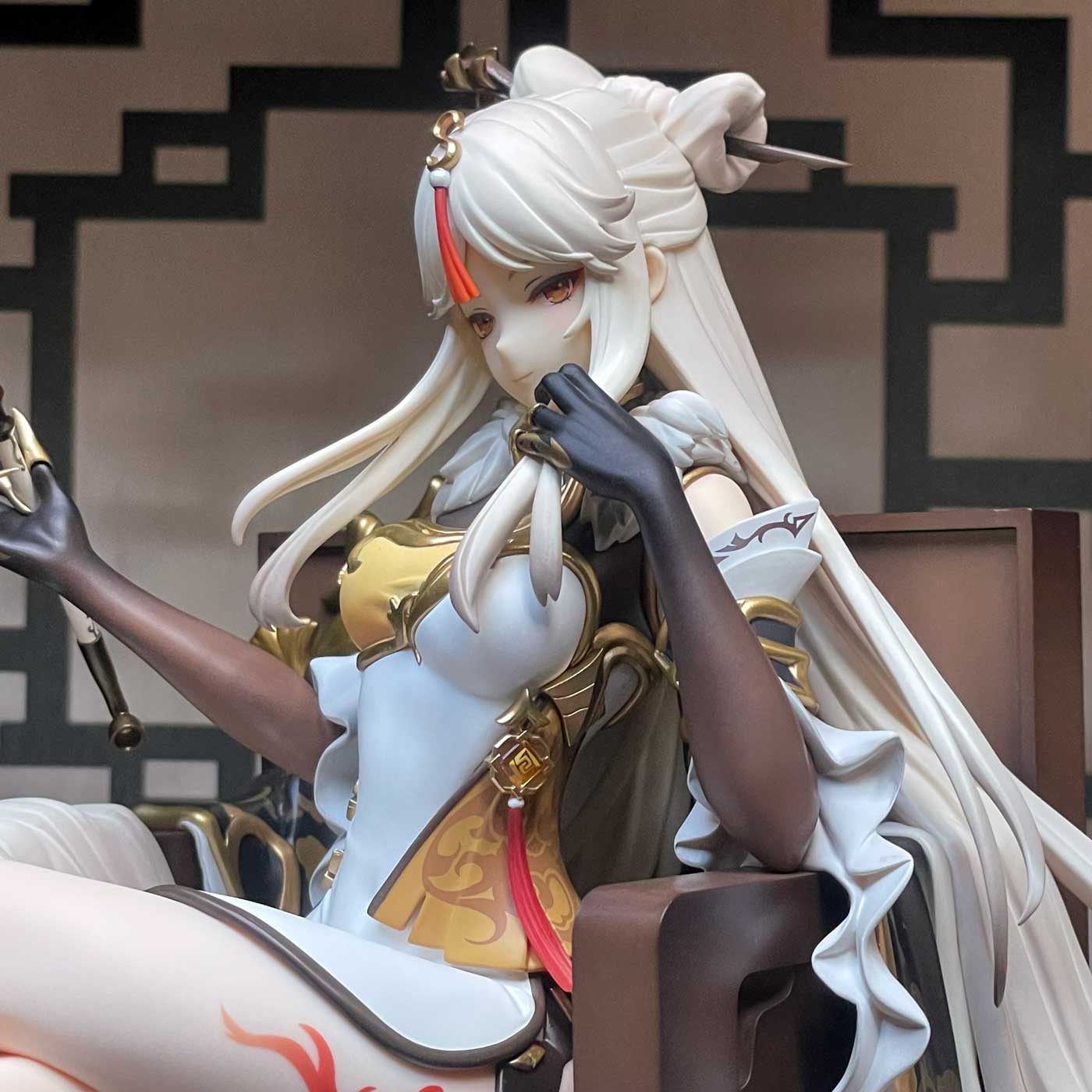 An unboxed Ningguang figure showing the side of her face